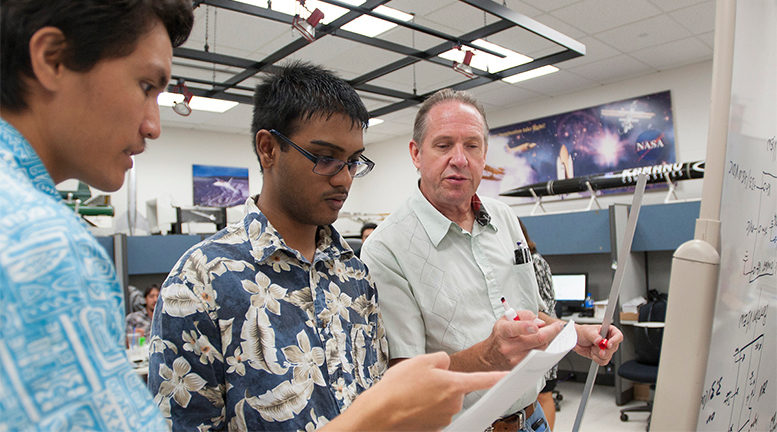 University of Hawaii Community College students work on a project to develop small payloads for space flight. Photo: UH
