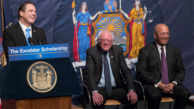 Andrew Cuomo (left) with Vermont Sen. Bernie Sanders (center) and William Thompson, board chair of the City University of New York, as the governor announces his free-tuition plan at LaGuardia Community College. Photo: AP/Mary Altaffer