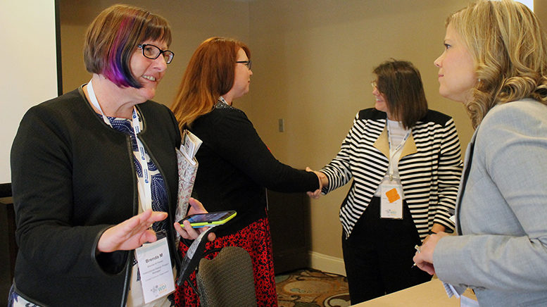 Brenda Perea (left), instructional design project manager at the Colorado Community College System, at a panel on TAACCCT grants at the American Association of Community Colleges' annual Workforce Development Institute. Photo: Ellie Ashford